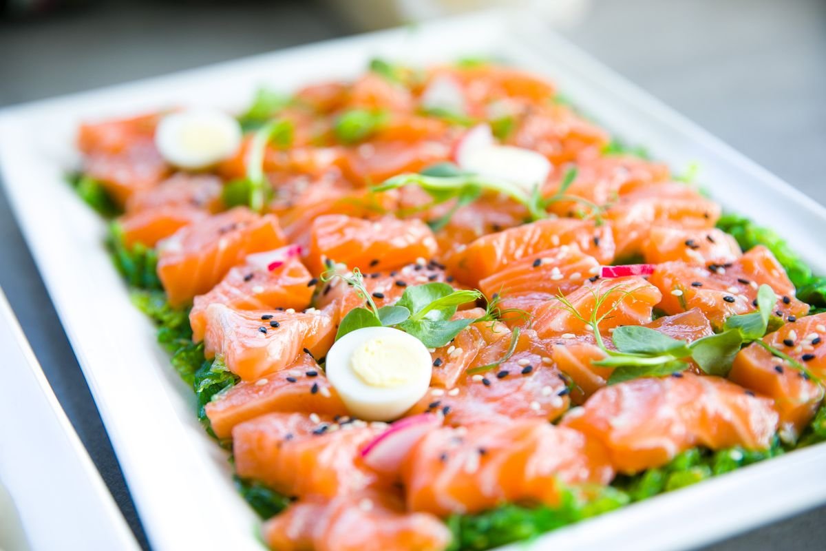 Plate of salmon and eggs, high-protein foods that support fat loss and muscle repair