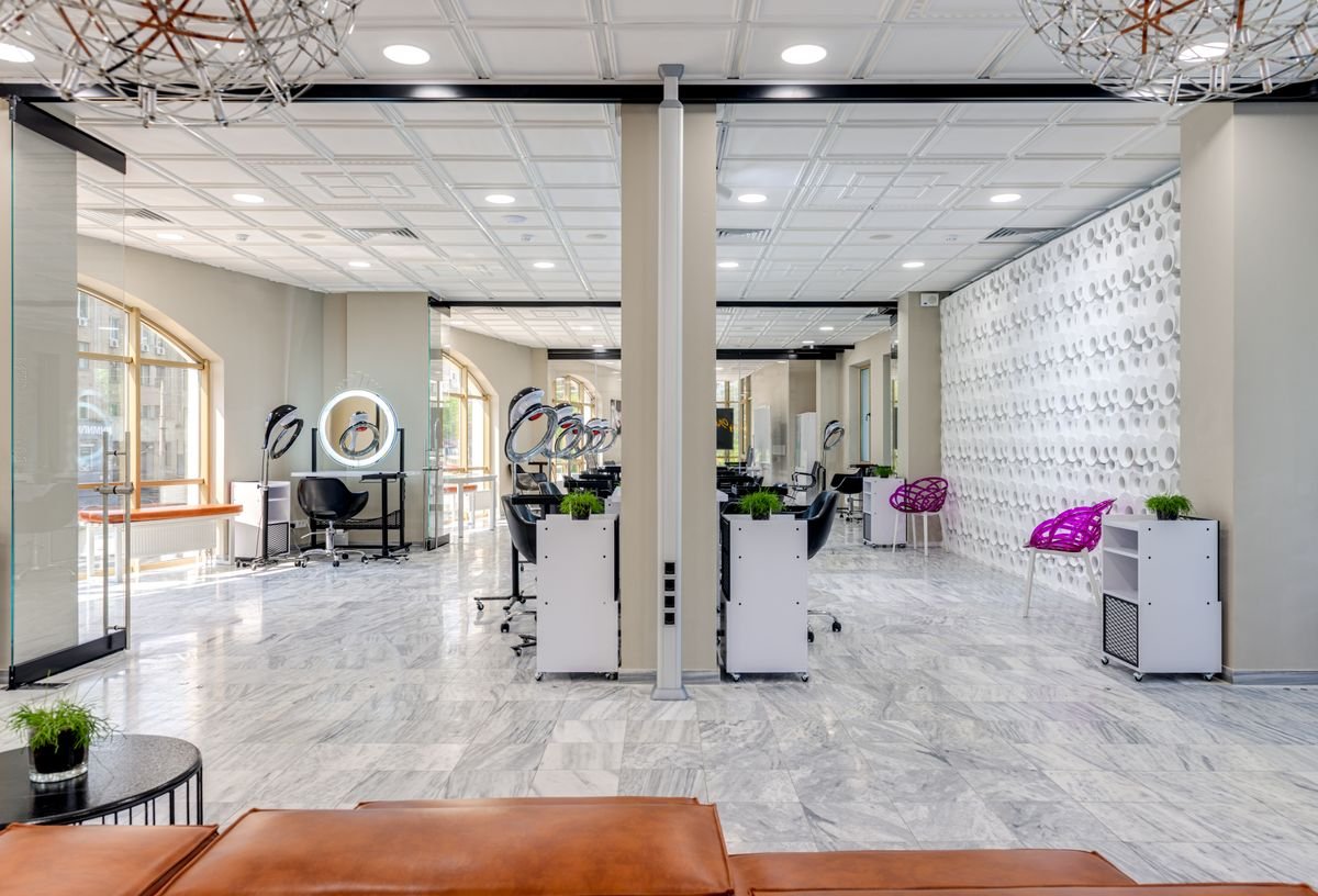 Modern salon interior where professional hair loss treatments like PRP and laser therapy are performed