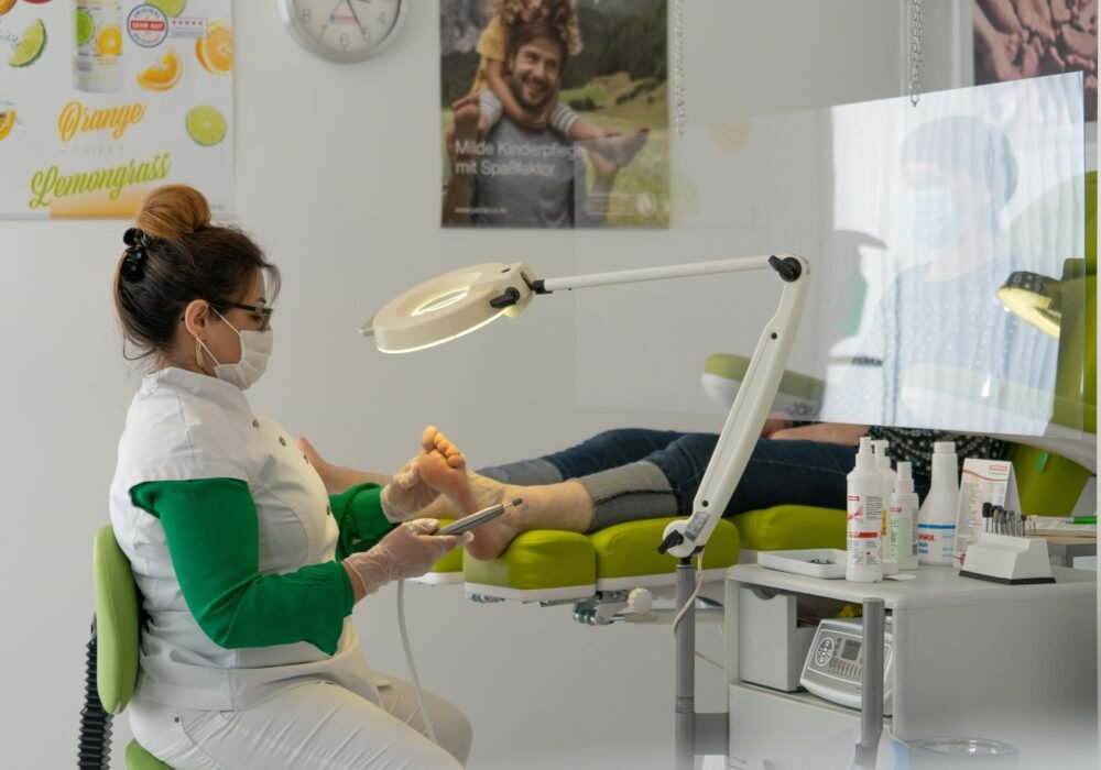 Podiatrist performing a clinical foot care procedure