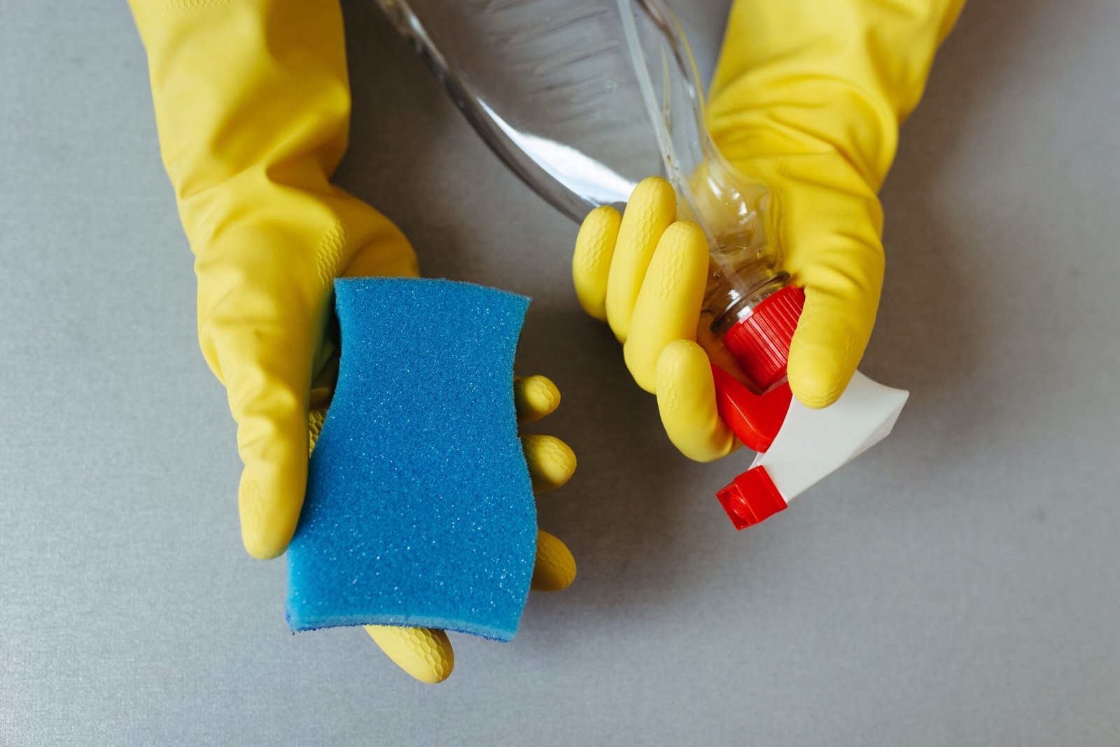 cleaning supplies and gloves used to disinfect a foot spa