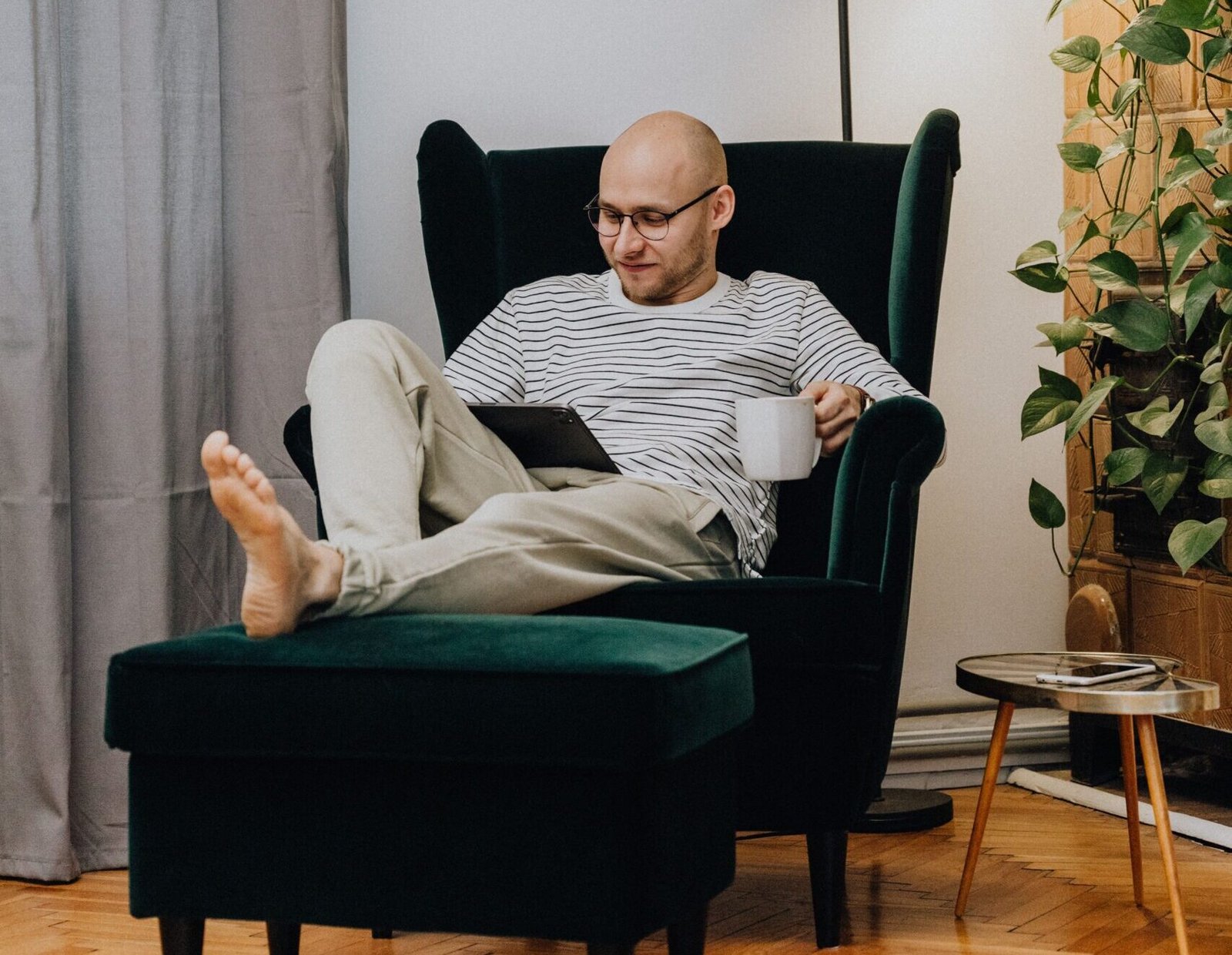 Man relaxing and resting in a reclining chair with head support