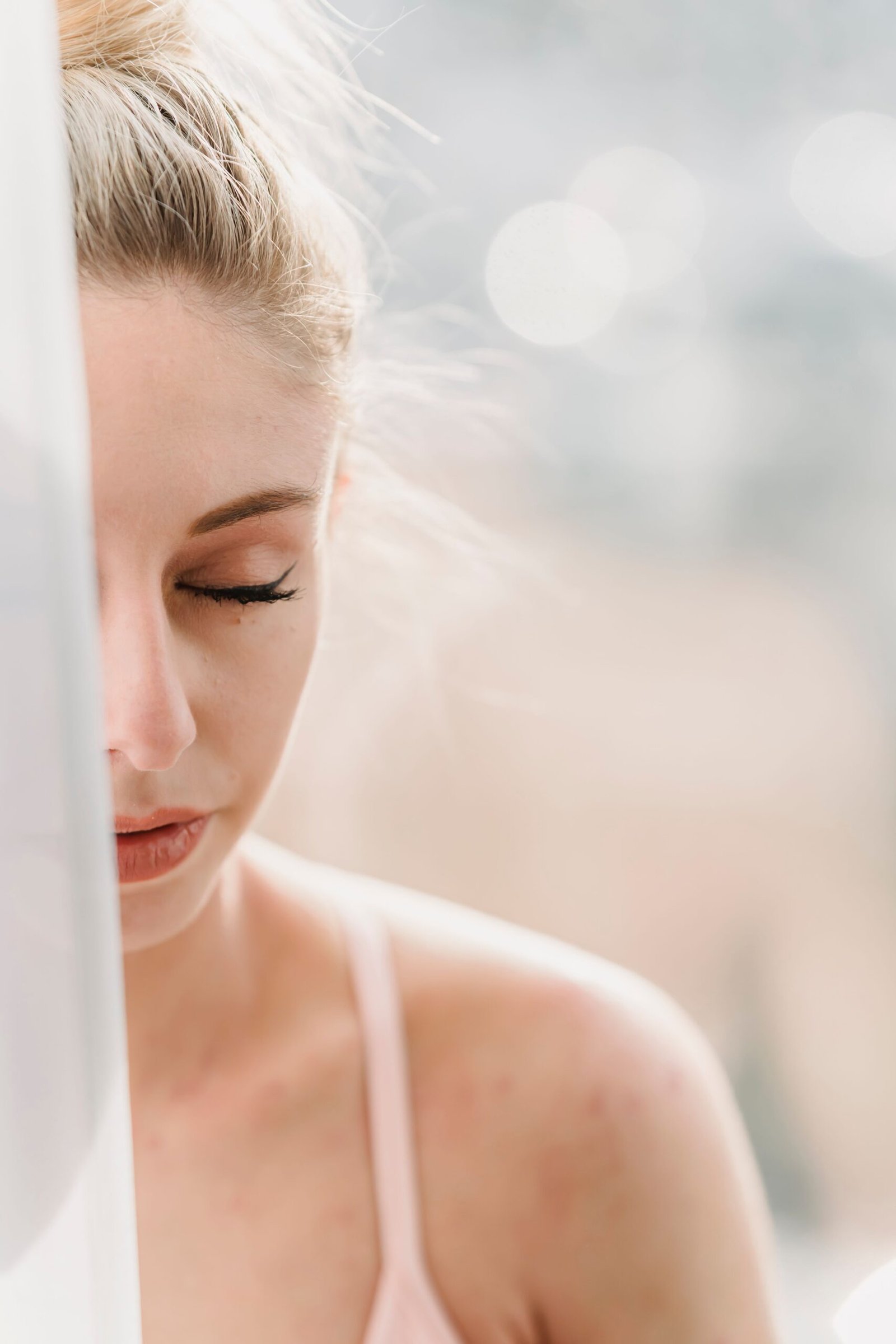Woman relaxing in natural light as part of a stress-relief routine