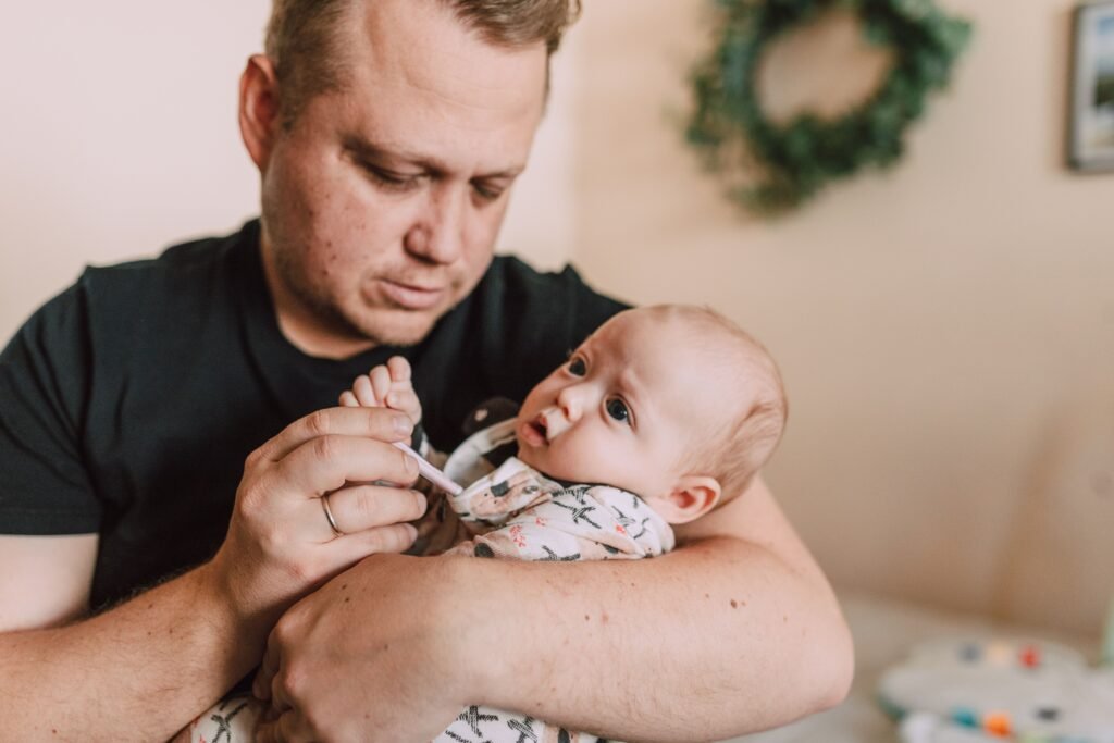 Checking a babys forehead temperature at home